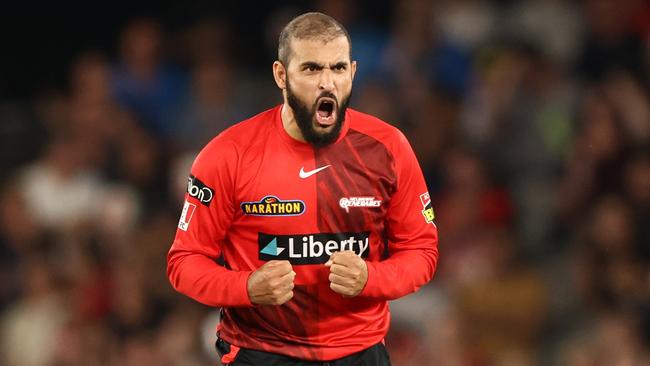 MELBOURNE, AUSTRALIA - JANUARY 24: Fawad Ahmed of the Renegades celebrates taking the wicket of Travis Head of the Strikers during the Men's Big Bash League match between the Melbourne Renegades and the Adelaide Strikers at Marvel Stadium, on January 24, 2023, in Melbourne, Australia. (Photo by Robert Cianflone/Getty Images)