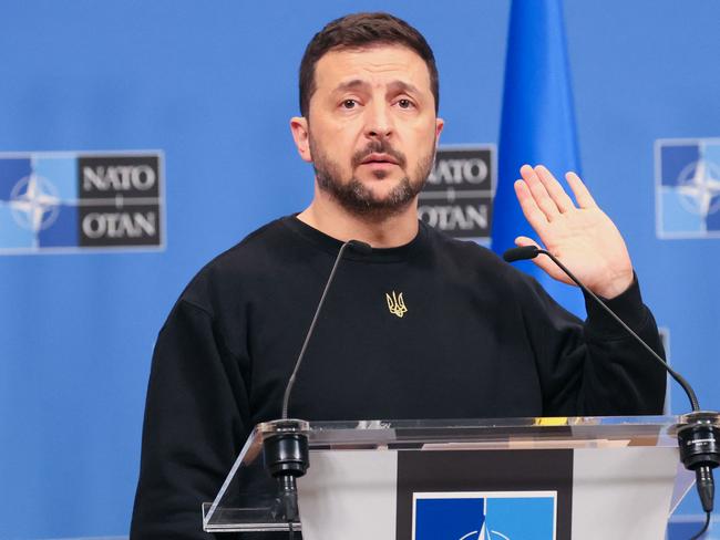 Ukraine's President Volodymyr Zelensky addresses media during a press conference with NATO Secretary General at the NATO headquarters in Brussels, on October 17, 2024. (Photo by FranÃ§ois WALSCHAERTS / AFP)