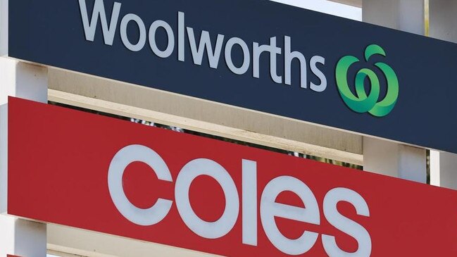 coles and woolies signs together