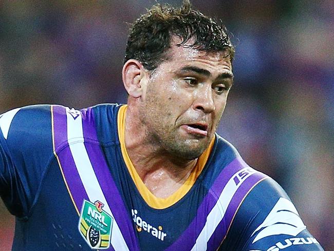 MELBOURNE, AUSTRALIA - MARCH 17:  Dean Finucane of the Storm is tackled by  Robbie Rochow of the Tigers  during the round two NRL match between the Melbourne Storm and the Wests Tigers at AAMI Park on March 17, 2018 in Melbourne, Australia.  (Photo by Michael Dodge/Getty Images)