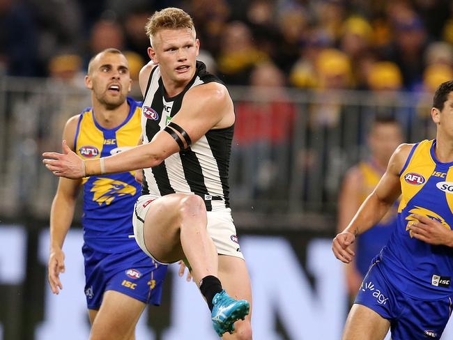 Adam Treloar showed no ill-effects on Saturday night, despite returning from dual hamstring surgery. Picture: Michael Klein