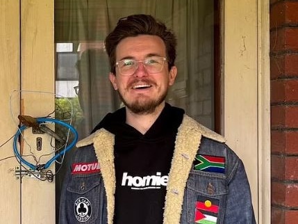 He posed in front of a clumsily locked front door of an "abandoned home". Picture: Supplied