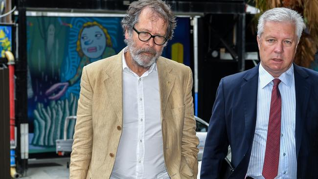 Australian director Neil Armfield (left) arrives at the Federal Court. Picture: AAP Image/Brendan Esposito