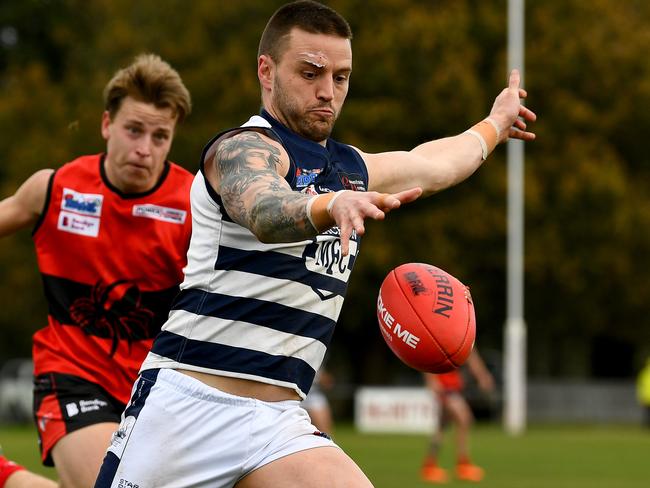 Jason Cooke of Macedon kicks during the round 16 Riddell District Football Netball League 2023 Bendigo Bank Seniors match between Romsey and Macedon at Romsey Park in Romsey, Victoria on August 5, 2023. (Photo by Josh Chadwick)