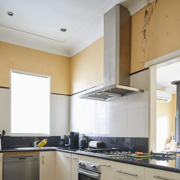 The kitchen in Sibon and Gerard’s home was dated and the walls were peeling.