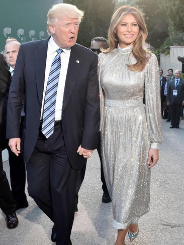 MAY 26: Melania shone in a shimmering silver Dolce and Gabbana dress and sparkling heels as she attended a concert at the ancient Greek Theatre of Taormina during a G7 summit in Sicily. Picture: AFP