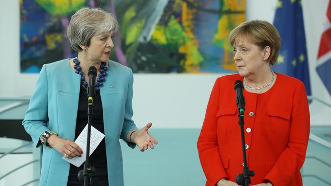 German Chancellor Angela Merkel and British Prime Minister Theresa May give statements to the media prior to talks at the Chancellery on July 5, 2018 in Berlin. Picture: Getty Images