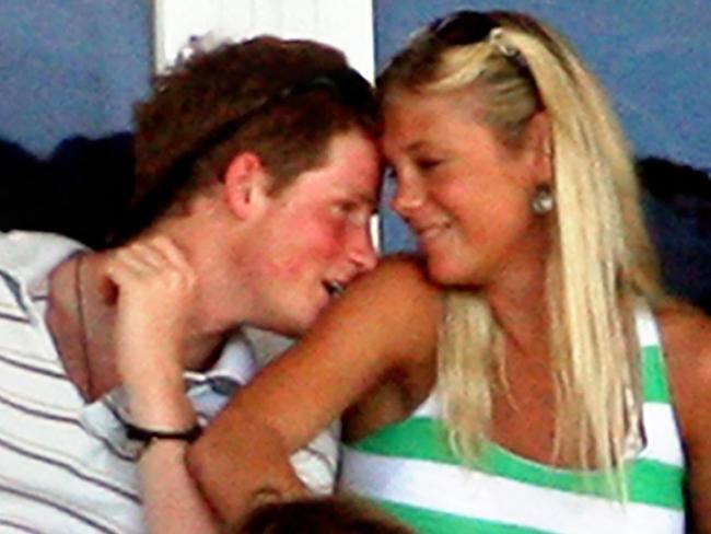 Britain's Prince Harry (L) enjoys a moment with his girlfriend Chelsy Davy as they watch the ICC World Cup Cricket 2007 Super Eight match between Australia and England at the Sir Vivian Richards Stadium in St John's, 08 April 2007. England scored 190-5 at 37 overs play as they elected to bat first after winning the toss. AFP (Photo : Jewel SAMAD)