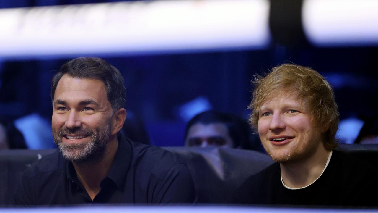 Eddie Hearn and Ed Sheeran watch a fight in Dublin ringside. (Photo by James Chance/Getty Images)