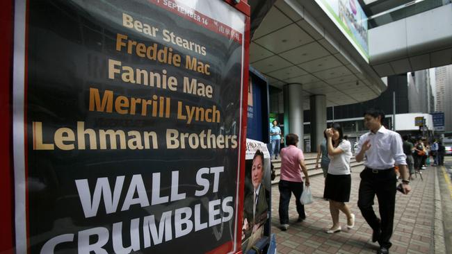 A newspaper headline about the US investment bank Lehman Brothers filing for bankruptcy, is seen on a street in Hong Kong in 2008.