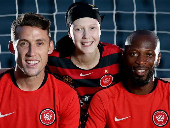 Chloe Osbourne meets her heroes Scott Neville and Romeo Castelen. Picture: Gregg Porteous