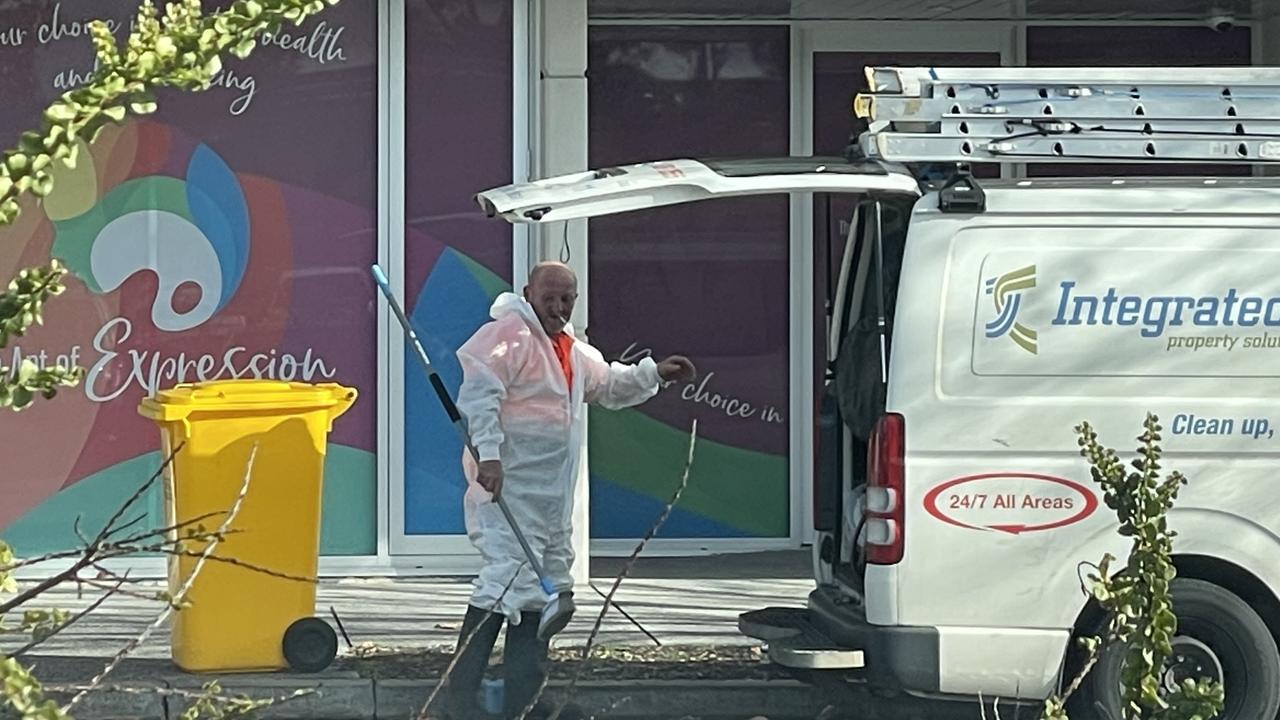 Cleaners at the Mawson Lakes apartment complex. Picture: Dylan Hogarth