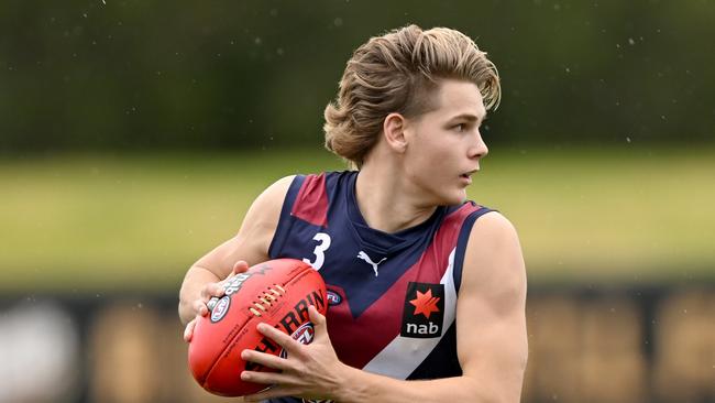 Will Ashcroft looks for an option. Picture: Morgan Hancock/AFL Photos/via Getty Images