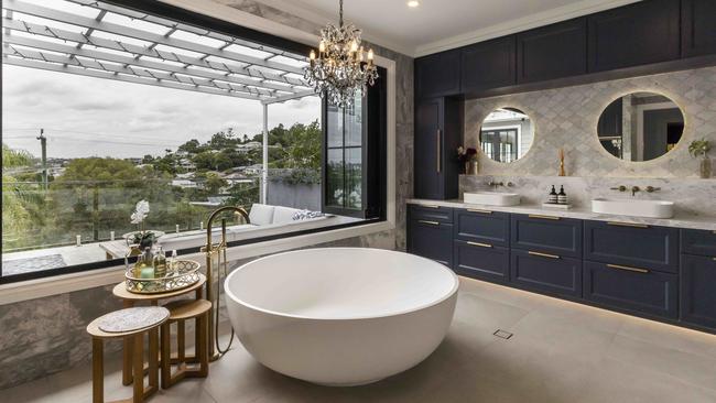 A scheme of marble, gold and navy blue is carried throughout the home. Picture: Glenn Hunt