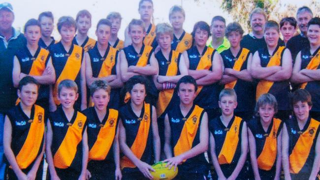 Kybybolite 2004 Junior Colts premiers where Jack Trengove (middle, fourth from left) is pictured with former AFL player Alex Forster (front left), Lachie Neale (second from left) and former Glenelg captain Andrew Bradley (third from left). Picture: Matt Turner