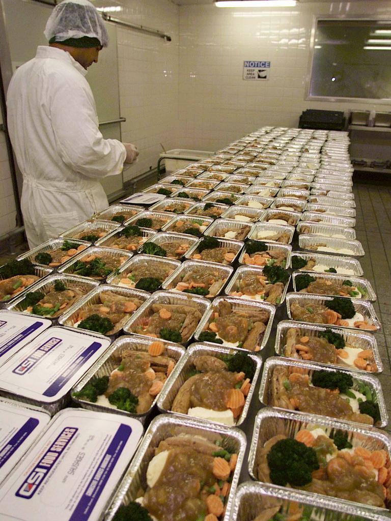 Inmate preparing food at Silverwater. Picture: Geoff Ward.