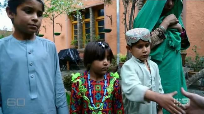 The children of Afghan man Ali Jan, who None Newspapers alleges was pushed off a cliff and shot by Mr Roberts-Smith. Picture: Channel 9