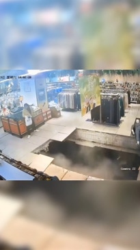 Chinese woman "eaten" by sinkhole in clothes store