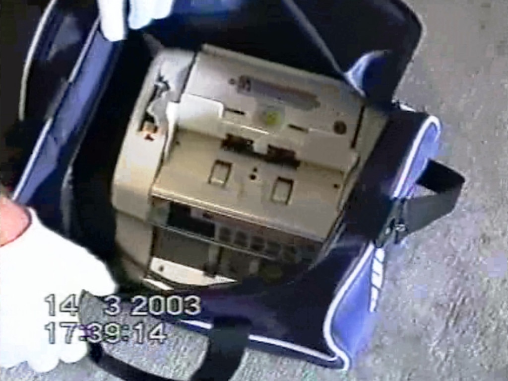 Police evidence photo showing a money counting machine, March 2003. Picture: Supplied