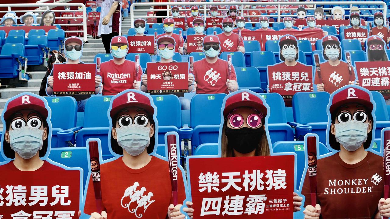Cut-outs of fans at a baseball game in Taiwan earlier this month. Collingwood is looking into something like this. (Photo by Sam Yeh / AFP)