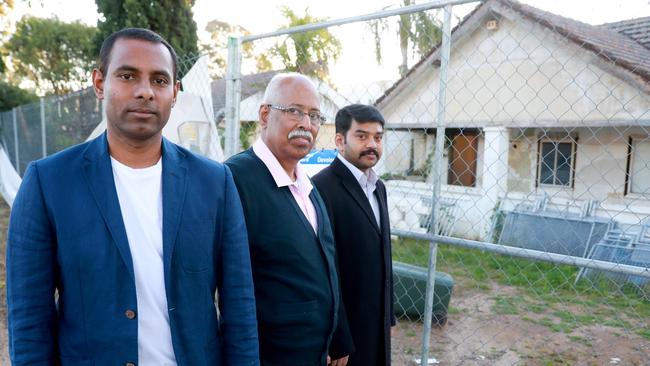 Satya Maddi, Arun Bhuta and Srinivas Sunki outside the site for the boarding house at Girraween. Picture: Angelo Velardo