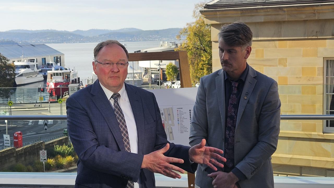 Minister for Children and Youth Roger Jaensch and Department of Education, Children and Young People deputy secretary Peter Whitcombe unveil the masterplan for a new Tasmanian Youth Justice Facility at parliament Square on Monday May 5, 2025.