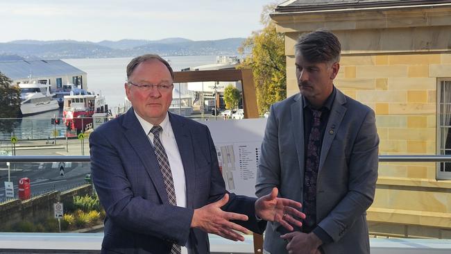 Minister for Children and Youth Roger Jaensch and Department of Education, Children and Young People deputy secretary Peter Whitcombe unveil the masterplan for a new Tasmanian Youth Justice Facility at parliament Square on Monday May 5, 2025.