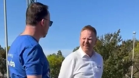 Stills from a video of Labor candidate Alex Dighton polling booth confrontation with a liberal volunteer.