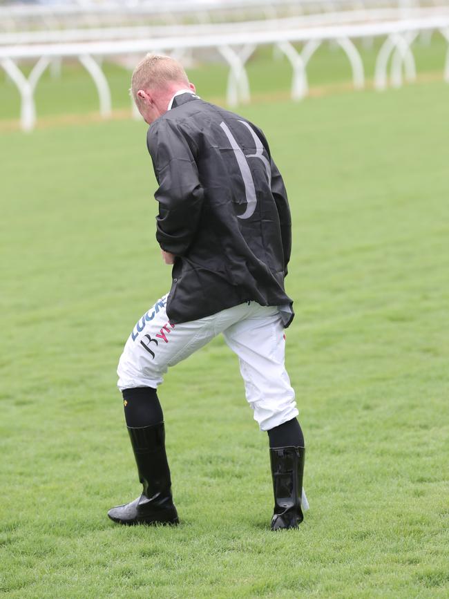 Veteran jockey Jim Byrne inspects the Eagle Farm.