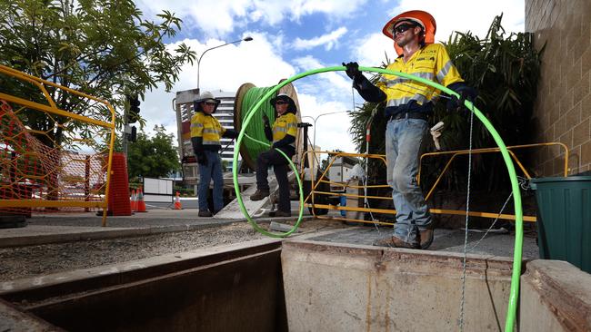 Linesman for NBN Co laying fibre optic cable in Cairns.