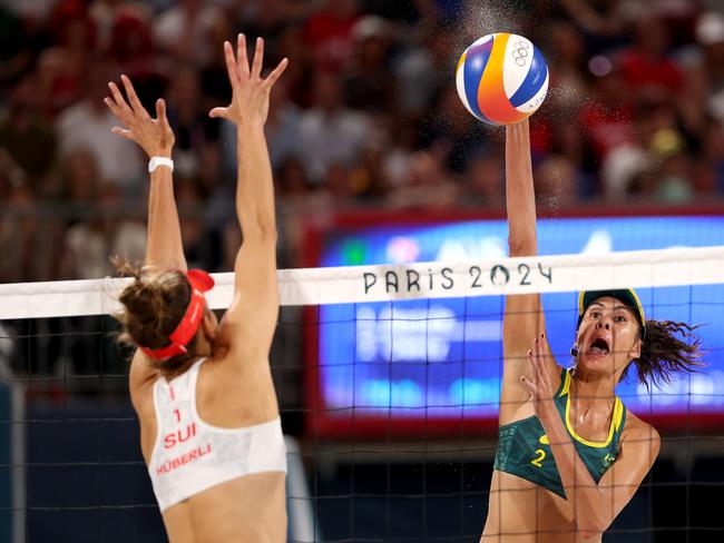 Taliqua Clancy attacks the net against Tanja Hueberli of Switzerland. Picture: Getty Images