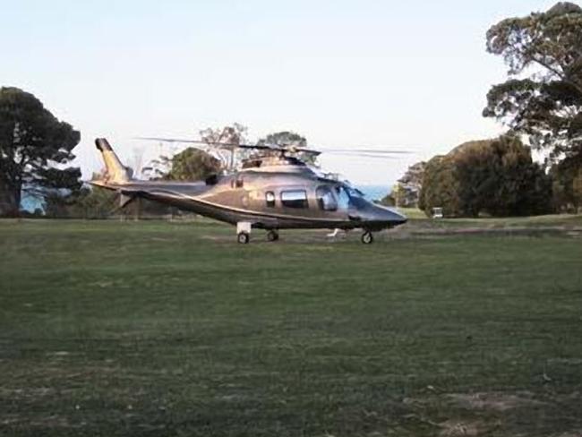 Bronwyn Bishop landing in a helicopter at a Geelong Golf Club in November 2014. Taxpayers were billed $5,227.27 for the 80km round-trip from Melbourne to Geelong.