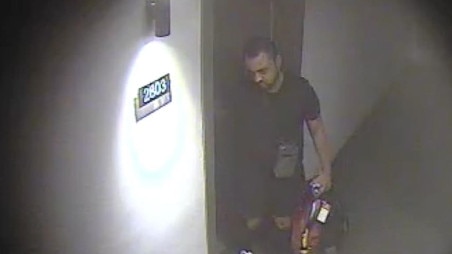Abuzar Sultani leaving his apartment on the night Michael Davey was shot dead.