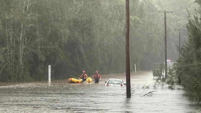 At approximately 11:20, Huskisson brigade was activated to a car and occupant stuck in floodwater in Woollamia. Picture: Facebook