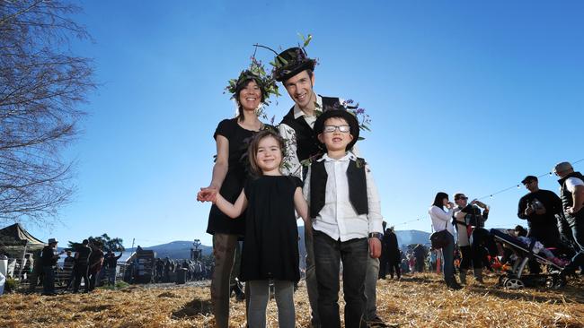 Amanda and Michael Boon with children, Elsie, 5 and Harry 7 all dressed up at the Midwinter festival at Willie Smiths Apple Shed. Picture: LUKE BOWDEN