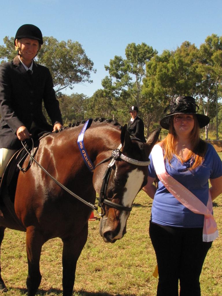 Leanne Hartwig won the RSL Local Galloway Hack at last year's Eidsvold show and was presented with her ribbon by Eidsvold 2012 Miss Showgirl runner-up Joanna Pickering. Photo Sue Harris / Central &amp; North Burnett Times