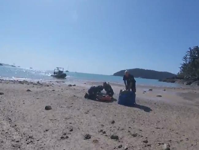 Gopro extraction footage of the 12-year-old girl who was attacked by a shark. Picture: RACQ Rescue