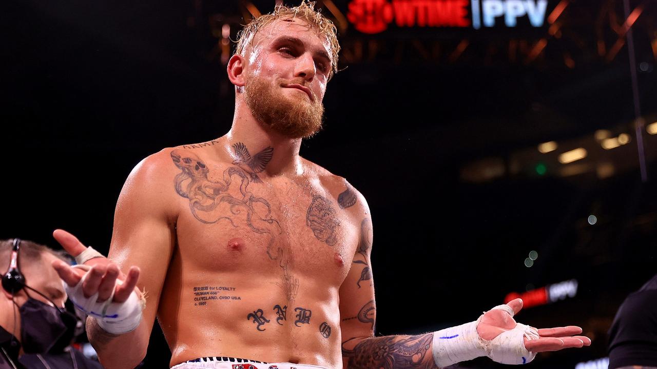 Jake Paul reacts to knocking out Tyron Woddley in the sixth round during a fight in December.