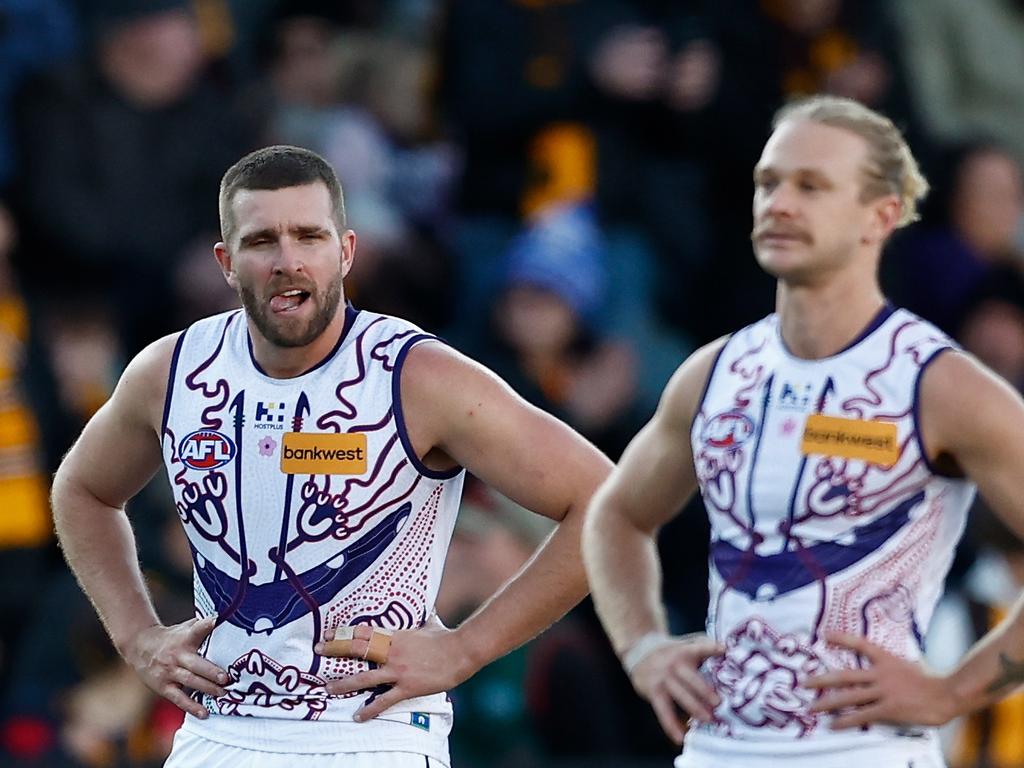 LAUNCESTON, AUSTRALIA – JULY 13: Luke Ryan (left) and Corey Wagner of the Dockers look dejected after a loss during the 2024 AFL Round 18 match between the Hawthorn Hawks and the Fremantle Dockers at the UTAS Stadium on July 13, 2024 in Launceston, Australia. (Photo by Michael Willson/AFL Photos via Getty Images)