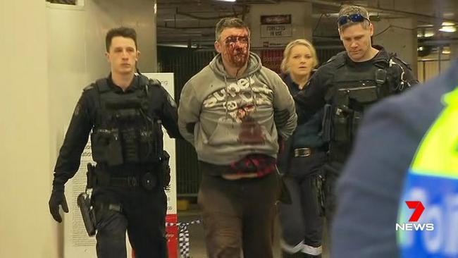 Fugitive Jonathan Dick was arrested in a parking garage Melbourne’s CBD. Picture: 7News.