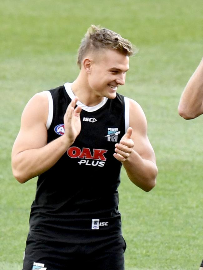 Worth a clap. Ollie Wines at Port Adelaide training at Adelaide Oval on Wednesday. Picture: AAP Image/Sam Wundke