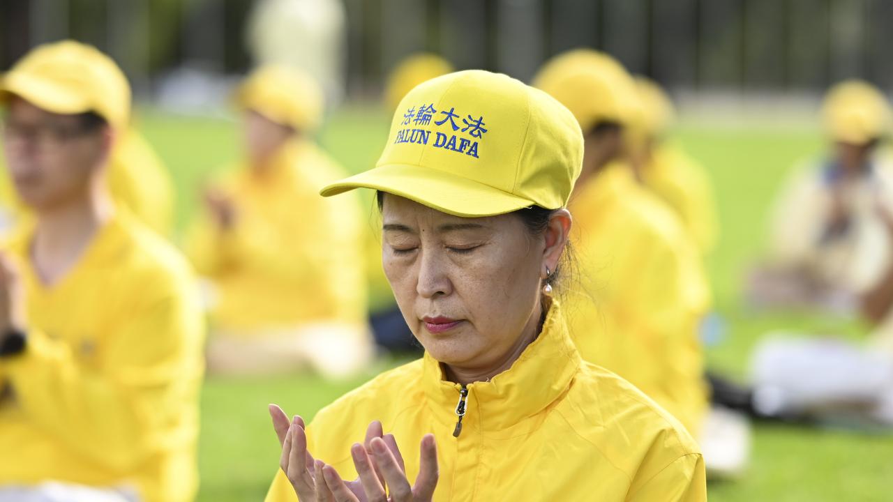 Falun Dafa practitioners travelled to Canberra to join the protests. Picture: NCA NewsWire / Martin Ollman