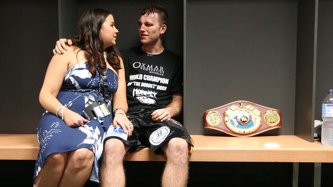 Jeff Horn sits with wife Jo and has a quiet moment after the fight. Picture Peter Wallis