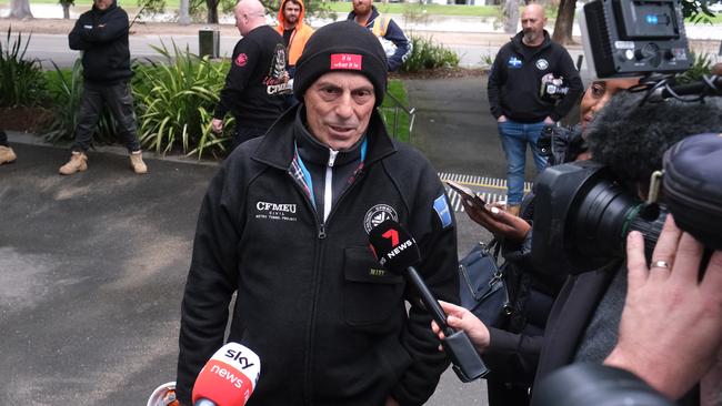 A CFMEU member addresses the media. Picture: Luis Enrique Ascui