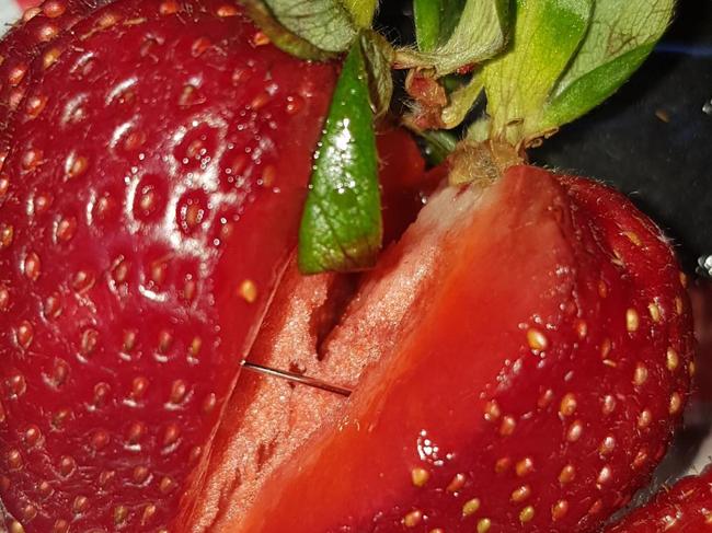 Needle found in strawberry purchased from a Foodland store.