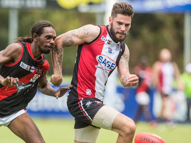 Southern Districts V Tiwi Bombers at Marrara, Tiwi Michael Dunn contests with Southern districts Josiah Farrer.  Pic Glenn Campbell