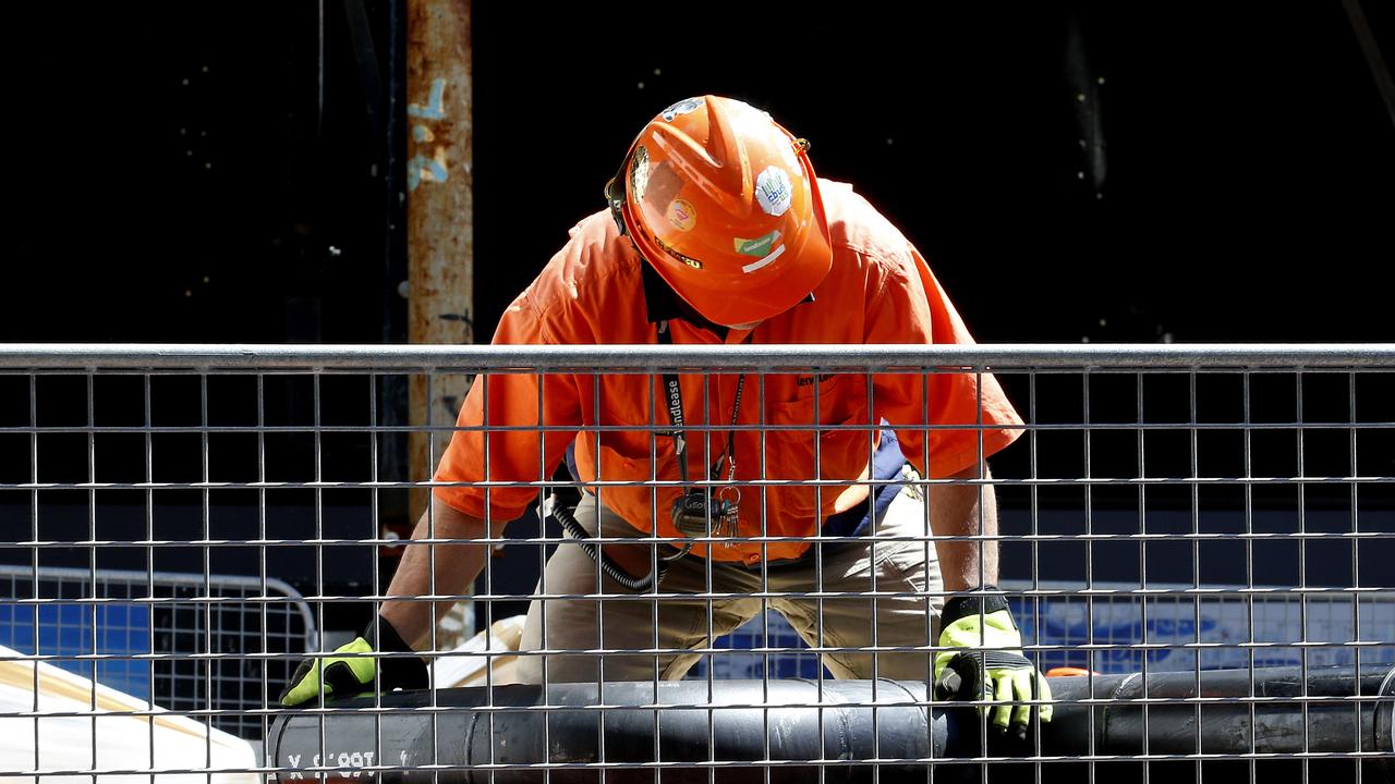 Construction workers at a Sydney building site. Picture: John Appleyard