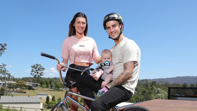 Logan with his four-month-old son Noah Martin and fiancee Kimberly Berroya. Picture Glenn Hampson