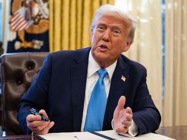 US President Donald Trump speaks to the press after signing an executive order in the Oval Office of the White House. Picture: AFP