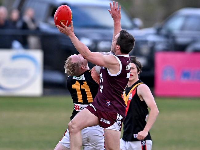 BFL: Bacchus Marsh’s Jake Owen can’t stop Braedan Kight of Melton. Picture: Andy Brownbill